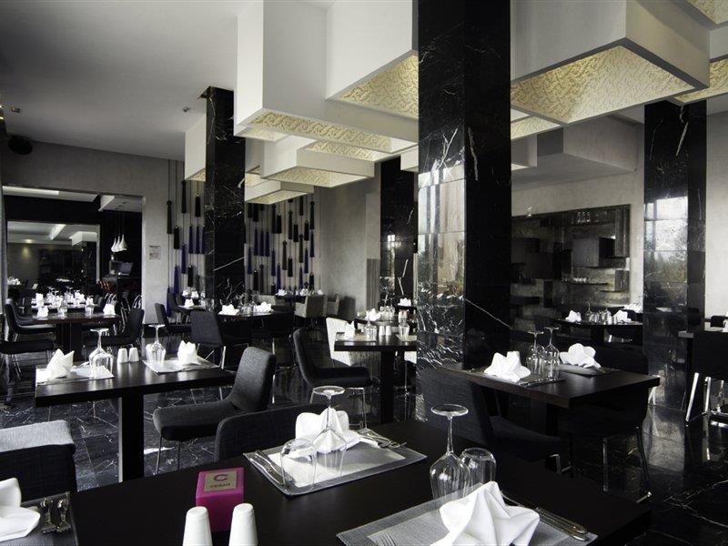 세사르 리조트 앤 스파 마라케시 외부 사진 Restaurant in the hotel